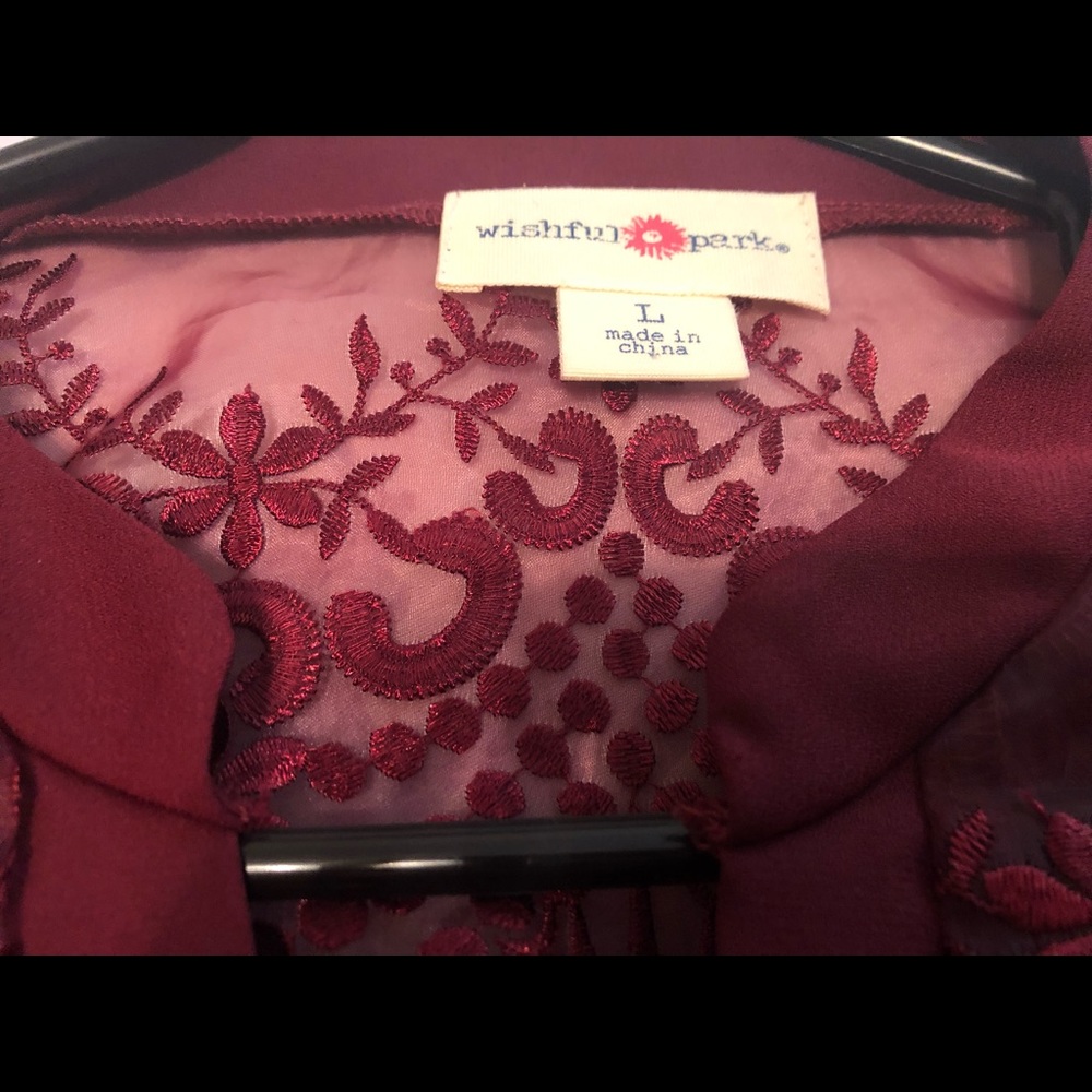 Red silk blouse